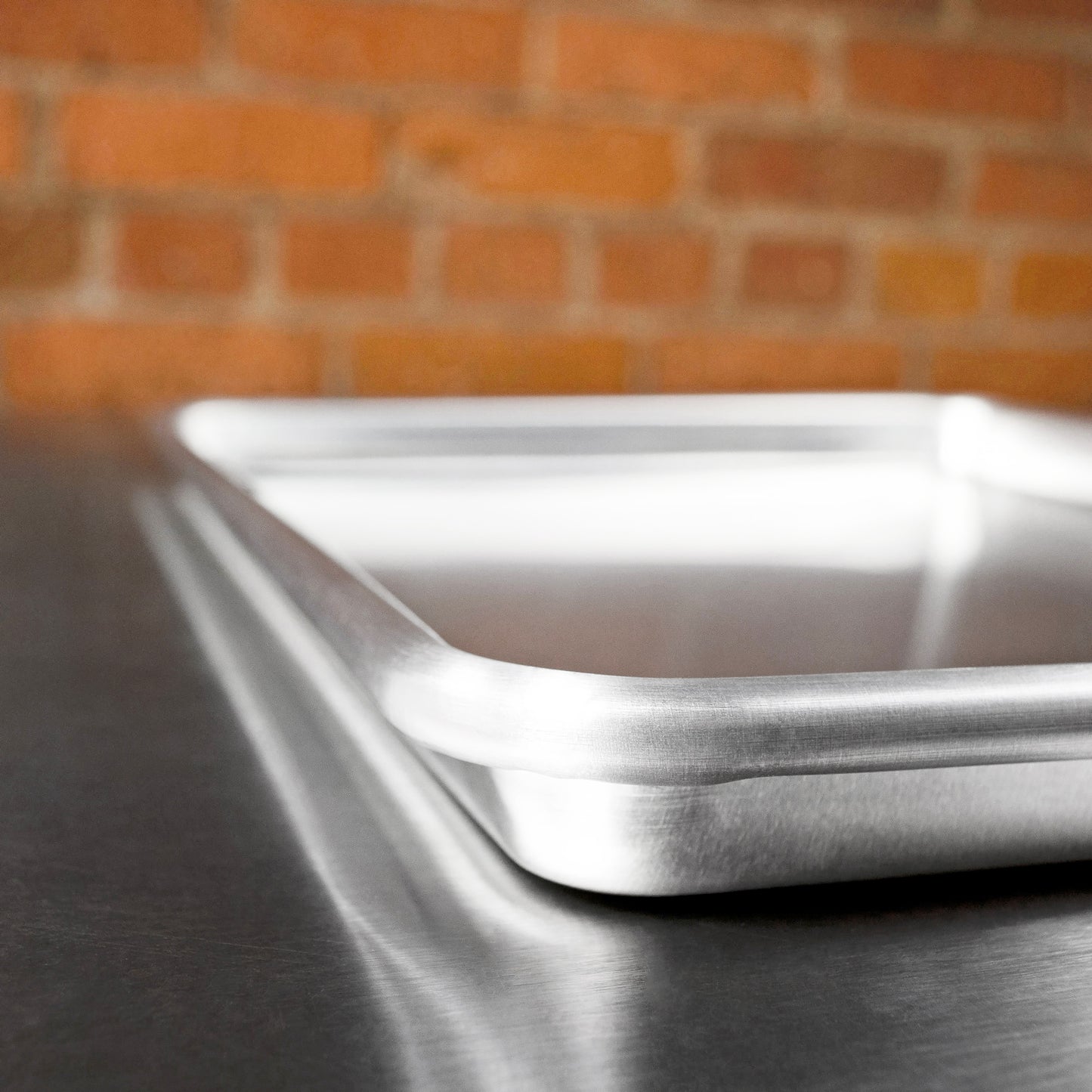 Half baking sheet pan in a brick bakery